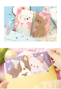 Close-up of cute animal mini greeting cards with yellow envelope for personalized gifts