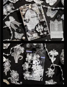 Detailed view of white vintage PET glitter stickers with floral and butterfly motifs