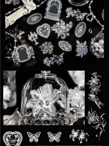 Macro detail of white lace PET stickers for scrapbooking on aesthetic black background.