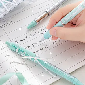Mint green ballet ribbon gel pen with ST tip for smooth writing on a daily planner