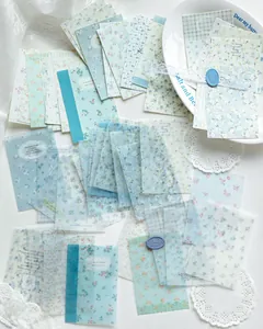 Variety pack of vintage floral scrapbooking paper with delicate vellum texture sheets