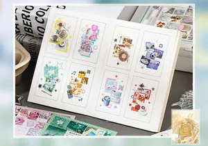 Detail view of an open Korean ins style sticker notebook with DIY collage designs.