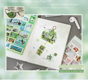 Close-up detail of Korean ins style green scrapbook stickers and DIY collage layout
