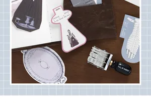 Macro detail of vintage scrapbooking stickers and antique style decorative paper sets