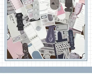Close-up of vintage scrapbooking material pack with diverse decorative paper tags