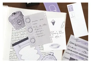 Close-up view of vintage purple manuscript scrapbook paper with hand-drawn sketches