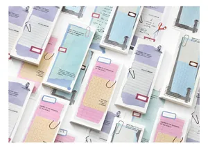 Künstlerische abreißbare Notizblöcke mit Collagenmustern und englischen Zitaten für Scrapbooks.