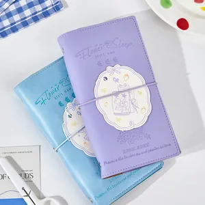 A6 loose-leaf notebook in purple and blue with floral and text embossed cover designs