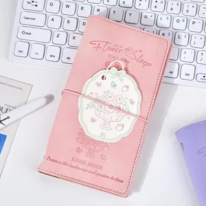 A6 pink aesthetic loose-leaf notebook with floral tag, elastic strap, and soft suede cover
