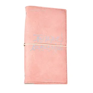 Minimalist pink A6 loose-leaf notebook with textured artistic cover and elastic strap