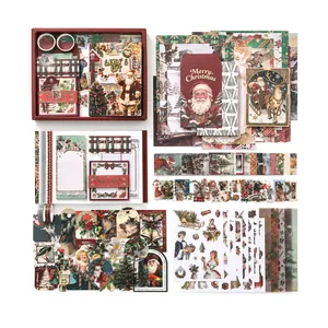 Vintage Christmas stationery gift set with notebook, stickers, and scrapbooking papers
