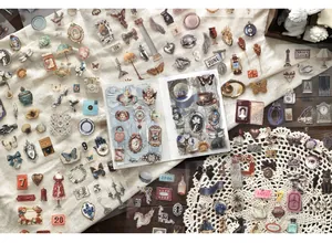 Collectie diverse vintage PET-stickers voor scrapbooking en creatieve DIY-projecten.