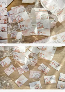 Vista dettagliata di adesivi washi tape a tema dessert per lo scrapbooking fai-da-te