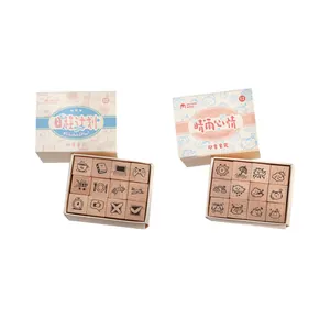 Twee dozen met creatieve Mr. Paper houten stempelsets voor doe-het-zelf journaling en planners