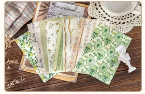 Detailopname van vintage scrapbooking materiaalpapier met bloemen voor DIY handwerk decoratie
