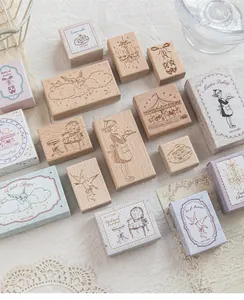 Detailed collection view of vintage fairytale beechwood stamps for journaling and scrapbooking