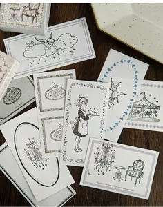 Close-up view of retro fairy tale wood stamps on paper showing intricate vintage designs