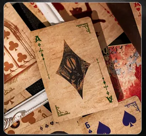Detailed macro shot of vintage Ace of Diamonds playing card featuring a mystical hand