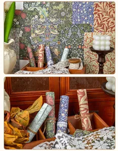 Detailed close-up of vintage floral scrapbook paper rolls for creative DIY craft decoration