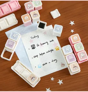 Detailed view of detachable stamps with cute lifestyle doodles on a planner page