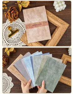 Various vintage textured decorative papers for DIY scrapbooking and journaling crafts.