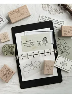 Vintage wooden stamps set with fairytale angel and merry-go-round patterns for journaling decoration