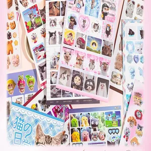 Close-up detail showing various funny cat meme stickers for DIY journaling and decoration