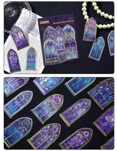 Detailed macro view of vintage PET stickers featuring gothic stained glass window art