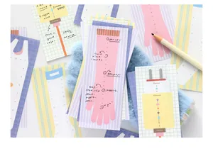 Close-up of PaperMore time axis memo pads with cute glove and sock illustrations
