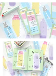 Detail of cute timeline memo pads used in a journal for daily planning and notes