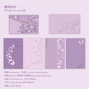 Set of 10 purple specialty papers with laser-cut butterfly and floral designs for scrapbooking