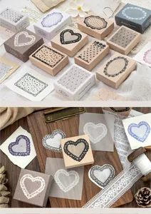 Macro view of vintage beech wood stamps with detailed lace patterns for DIY journal crafts