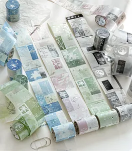 Detail view of vintage silver foil die-cut washi tape with floral patterns and motifs