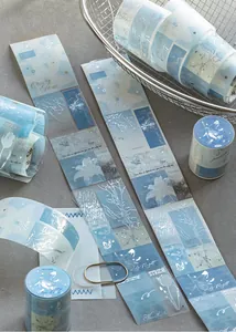 Misty blue PET washi tape with elegant silver foil floral and celestial patterns