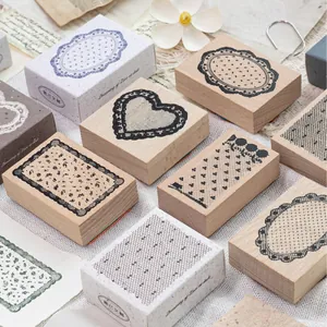 Vintage beech wood stamps with delicate lace border designs for DIY scrapbooking decor