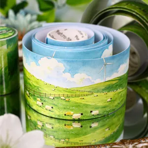 Retro Story washi tape featuring a pastoral green field and sheep landscape design.
