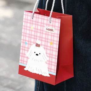 Cute medium vertical paper gift bag featuring white dog illustration and pink plaid pattern