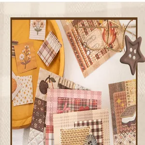 Close-up of vintage fabric patterns on scrapbooking material paper for DIY decoration