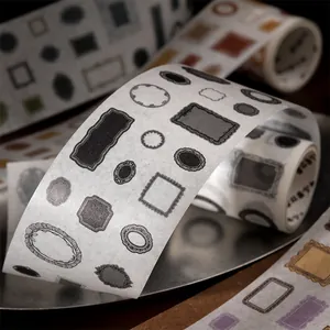 Vintage style decorative washi tape with various mini frame die-cut designs for scrapbooking