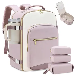 Large pink travel backpack set with three packing cubes and side pocket for tumbler
