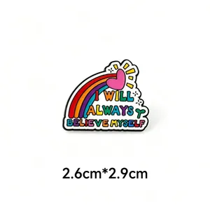 Detailed view of colorful rainbow enamel pin with inspirational quote I will always believe myself