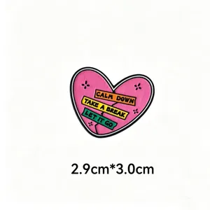 Detailed view of pink heart enamel pin with motivational quotes, size 2.9x3.0cm