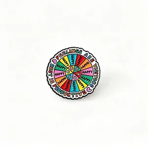 Detailed view of colorful motivational enamel pin badge measuring 3.1cm by 2.9cm