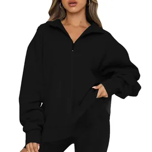 Close-up detail of black half-zip pullover sweatshirt for women's casual wear