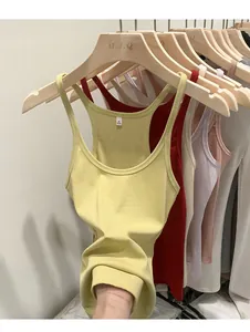 Detailed view of slim-fit ribbed knit tank tops available in various vibrant summer colors