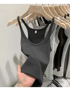 Close-up detail of grey knitted ribbed camisole showing the fabric elasticity and texture