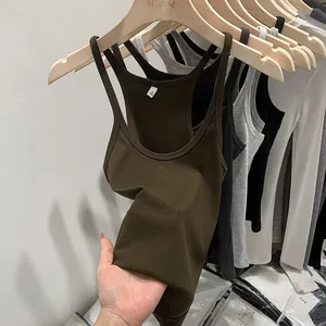 Close-up of slim fit ribbed knit tank top camisole for women showing fabric elasticity