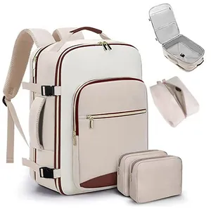Detailed view of a premium cream and brown travel backpack set with packing cubes.
