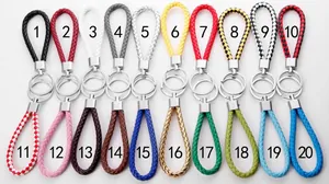 Collection de 20 porte-clés en cuir PU tressé de différentes couleurs avec anneaux