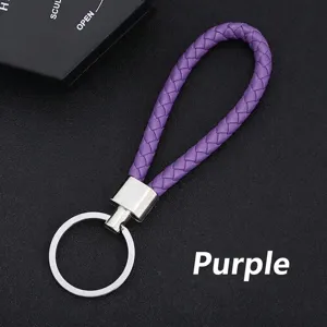 Detail view of a purple braided PU leather keychain featuring a silver metal ring
